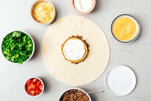 making a crunchwrap supreme | foodiesanddrink.com