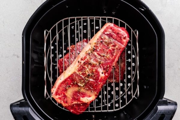 steaks in air fryer basket | foodiesanddrink.com