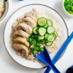 Super simple and satisfying Hainanese chicken rice: juicy steamed chicken and ginger garlic rice cooked in the same pot. It’s what you want for dinner, right now! #hainanesechickenrice #chickenrice #recipes #dinner #onepot #easy #chickenrecipe #rice #chickenandrice