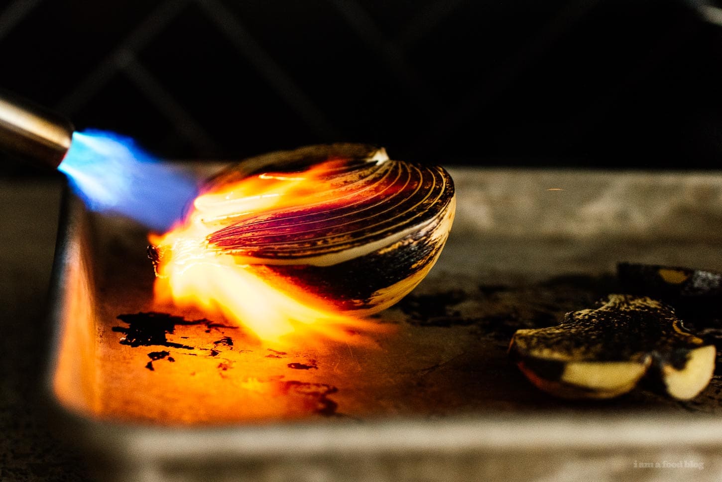 charring onions with a blowtorch | foodiesanddrink.com